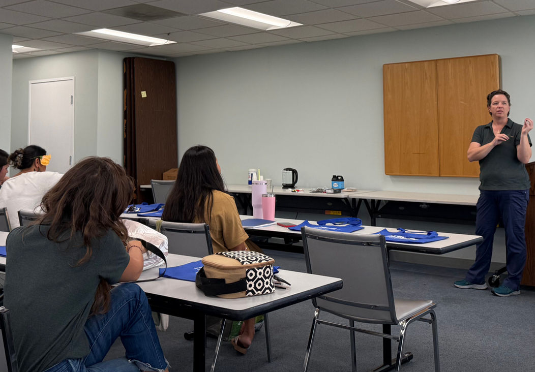ATRC staff training a group of students on assistive technology