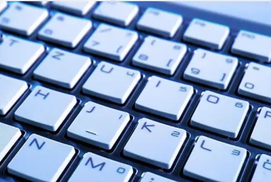 Close-up of a laptop keyboard with large high-contrast key labels
