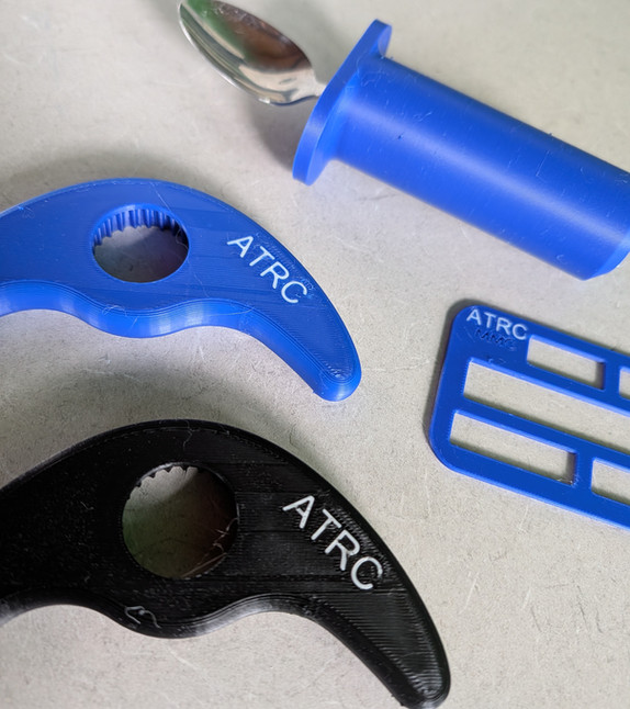 A 3D printer producing an assistive device