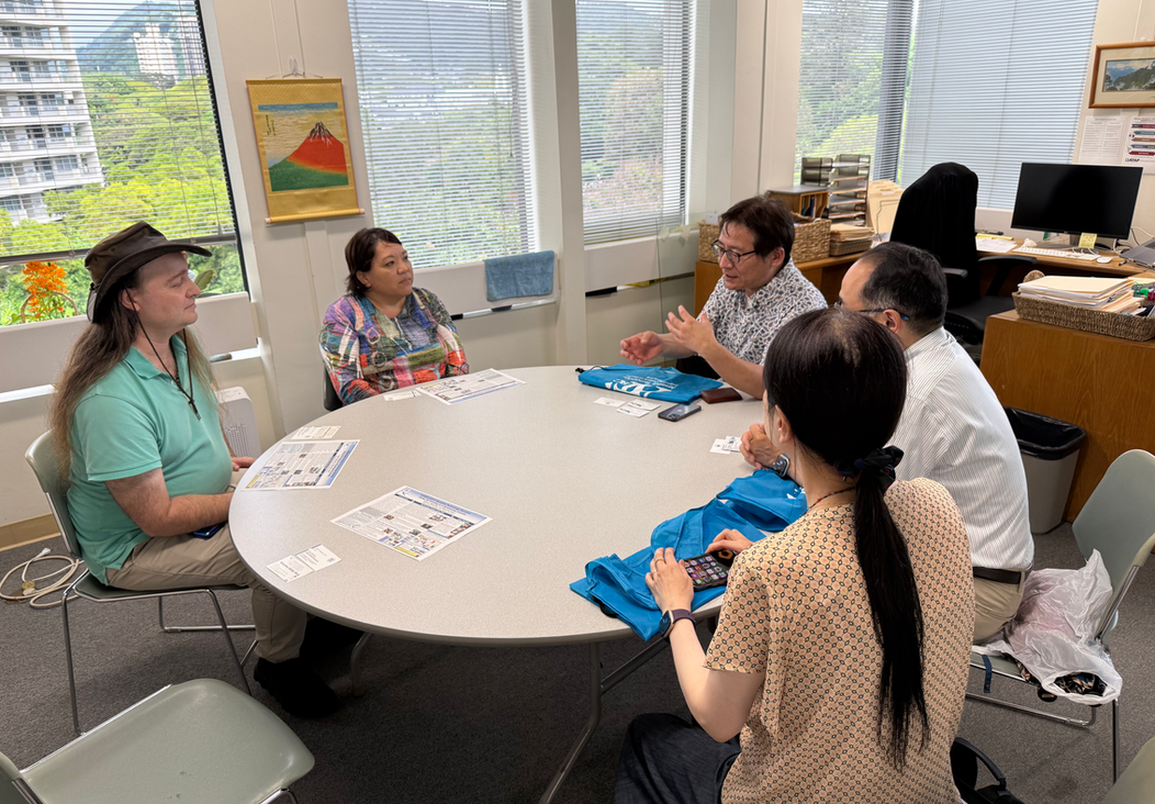 ATRC staff and partners meeting around a table