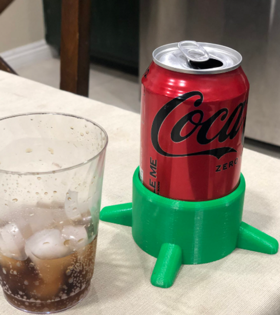 A can stabilizer holding a drink can